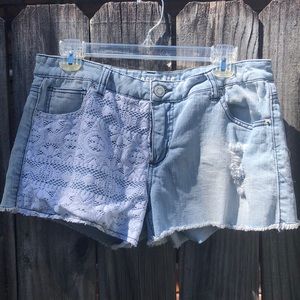 Blue jean shorts with white lace accents